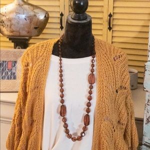 Golden brown mid length necklace